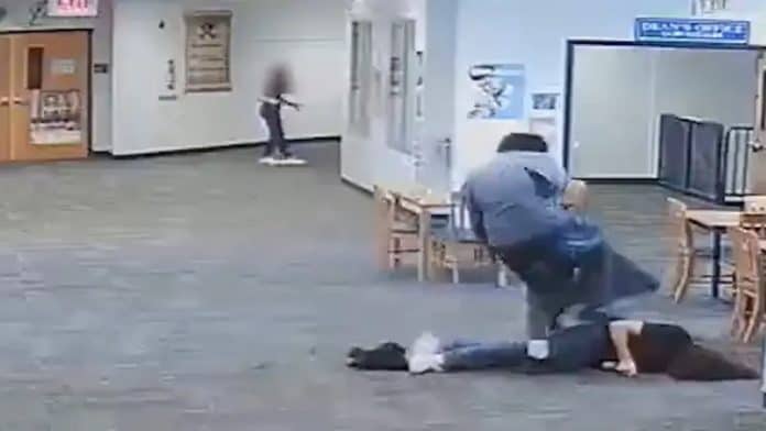 A student violently beats his teacher