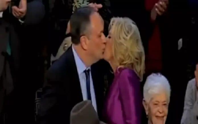 Biden's wife kiss  his vice-president