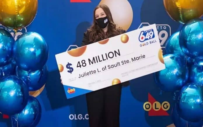 she bought a lottery ticket and won the grand prize